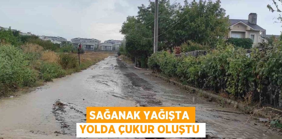 SAĞANAK YAĞIŞTA YOLDA ÇUKUR OLUŞTU