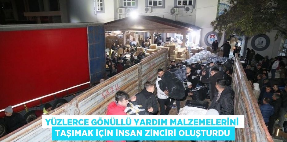 YÜZLERCE GÖNÜLLÜ YARDIM MALZEMELERİNİ TAŞIMAK İÇİN İNSAN ZİNCİRİ OLUŞTURDU