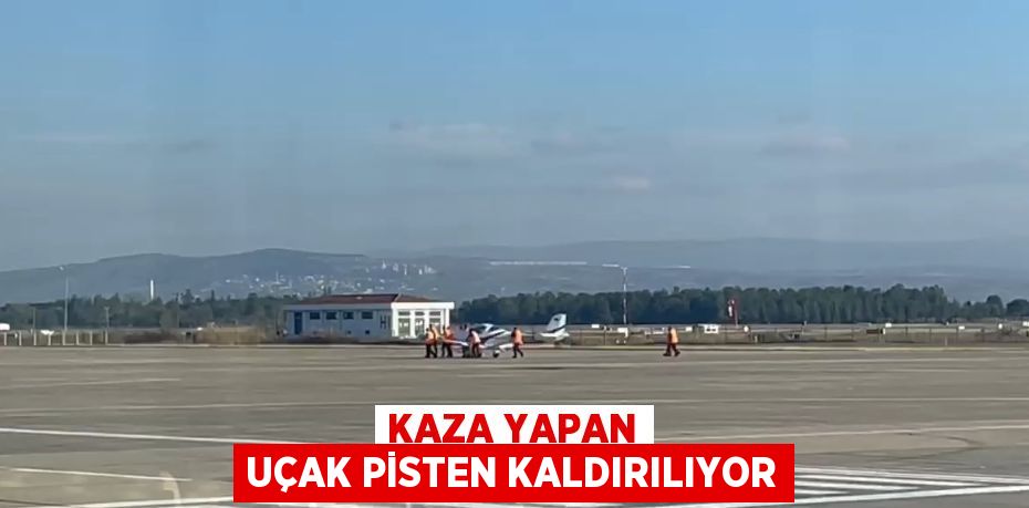 KAZA YAPAN UÇAK PİSTEN KALDIRILIYOR