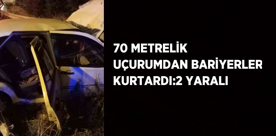 70 METRELİK UÇURUMDAN BARİYERLER KURTARDI:2 YARALI