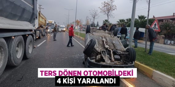 TERS DÖNEN OTOMOBİLDEKİ 4 KİŞİ YARALANDI