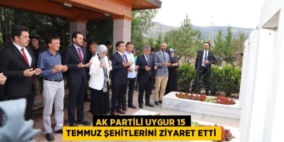 AK PARTİLİ UYGUR 15 TEMMUZ ŞEHİTLERİNİ ZİYARET ETTİ
